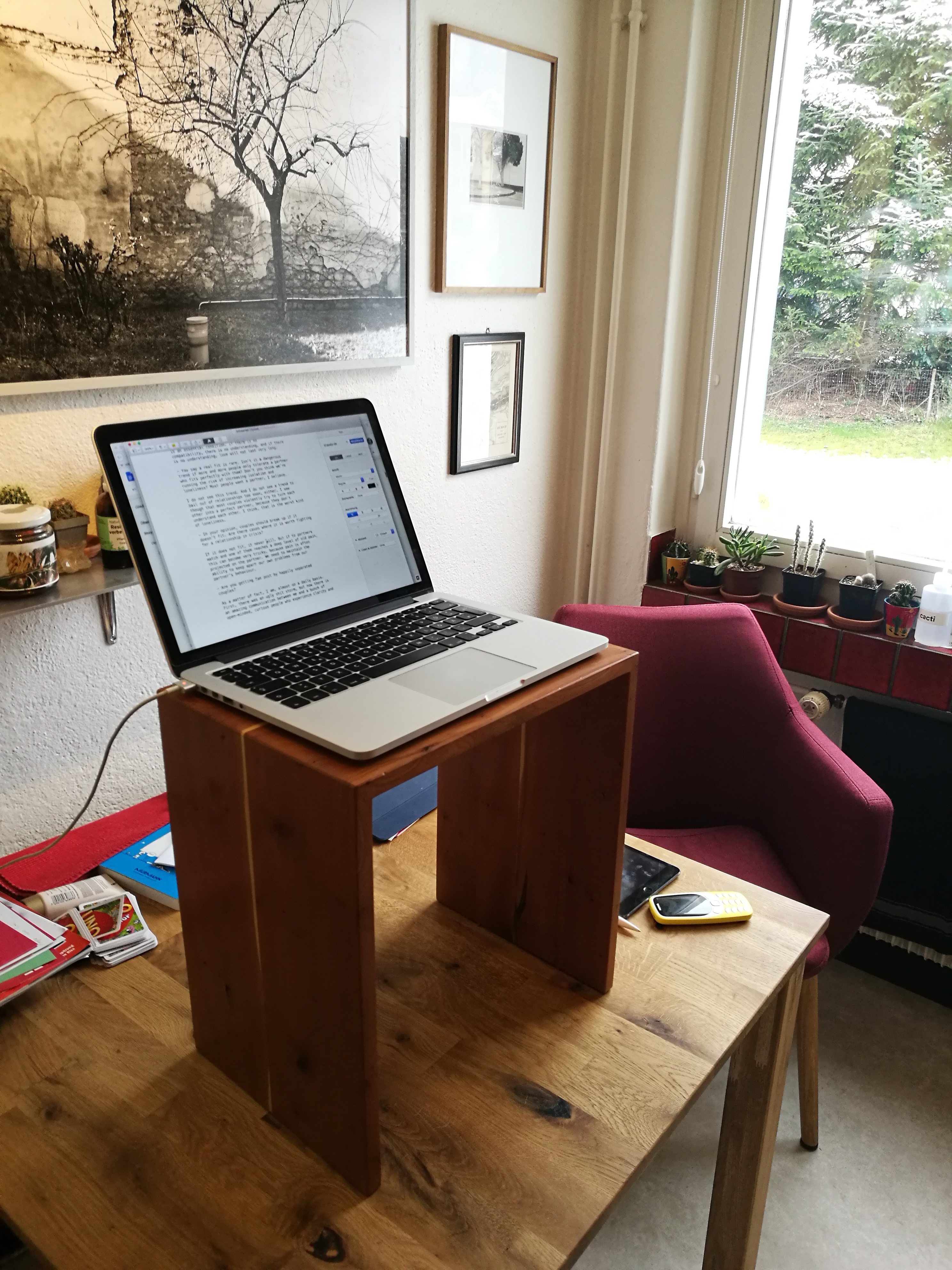 Meyer’s writing environment with an improvised standing desk. He uses Pages for finetuning the layout of his manuscripts.